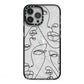 Abstract Face iPhone 13 Pro Max Black Impact Case on Silver phone
