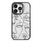 Abstract Face iPhone 14 Pro Black Impact Case on Silver phone