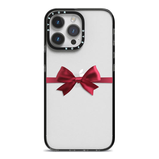 Christmas Bow iPhone 14 Pro Max Black Impact Case on Silver phone