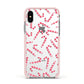 Christmas Candy Cane Apple iPhone Xs Impact Case Pink Edge on Silver Phone