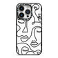 Continuous Abstract Face iPhone 14 Pro Black Impact Case on Silver phone