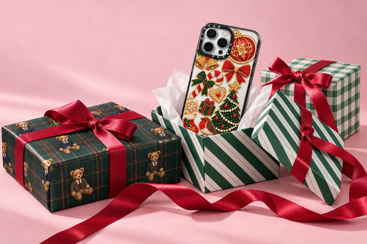 Teddy Traditions, Forest Ribbon Stripe and Evergreen Gingham Christmas gift wrap, with a Dyefor Christmas Keepsakes phone case emerging from a gift box