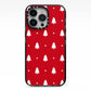 Classic Red Christmas Trees iPhone 13 Pro Black Impact Case on Silver phone