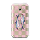 Pink Checkerboard Sardines Samsung Galaxy A3 2017 Case on gold phone