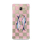 Pink Checkerboard Sardines Samsung Galaxy A9 2016 Case on gold phone