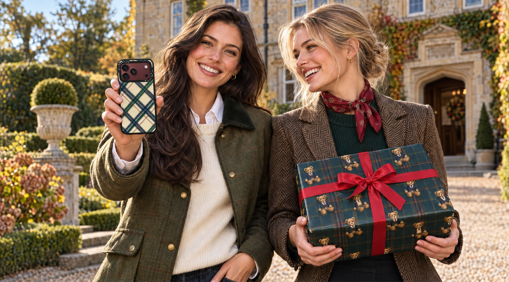 Heritage Club Plaid case on a Burgundy iPhone 18 Pro Max beside Teddy Traditions gift wrap in a country manor setting