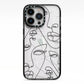 Abstract Face iPhone 13 Pro Black Impact Case on Silver phone
