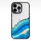 Agate Pale Blue and Bright Blue iPhone 13 Pro Black Impact Case on Silver phone