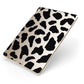 Black Cow Print Apple iPad Case on Gold iPad Side View