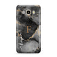 Black Marble Samsung Galaxy J7 2016 Case on gold phone