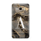 Black and Gold Marble Samsung Galaxy J7 2016 Case on gold phone