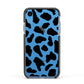 Black and White Cow Print Apple iPhone XR Impact Case Black Edge on Blue Phone