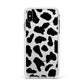 Black and White Cow Print Apple iPhone Xs Max Impact Case White Edge on Silver Phone