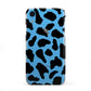 Black and White Cow Print iPhone XR 2D Snap Case on Blue Phone