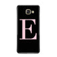 Black with Pink Personalised Monogram Samsung Galaxy A3 2016 Case on gold phone