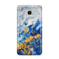 Blue And Gold Marble Samsung Galaxy J7 2016 Case on gold phone