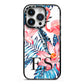 Blue Leaves Pink Flamingos iPhone 14 Pro Black Impact Case on Silver phone