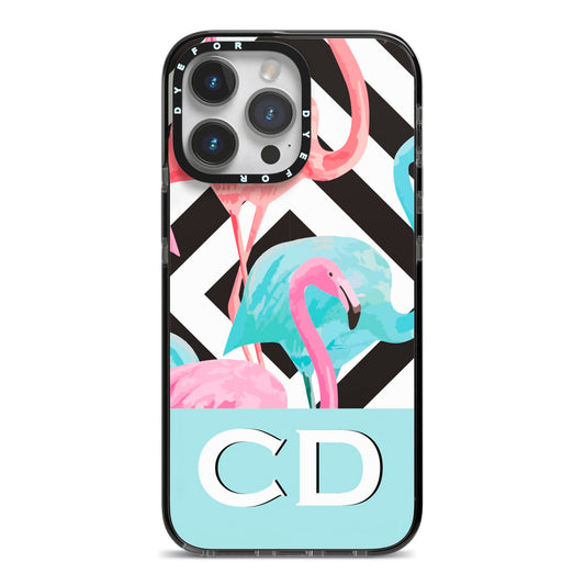 Blue Pink Flamingos iPhone 14 Pro Max Black Impact Case on Silver phone