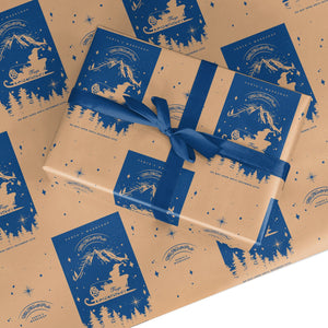 Personalisiertes Geschenkpapier mit blauem Weihnachtsmannschlitten