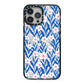 Blue and White Flowers iPhone 13 Pro Max Black Impact Case on Silver phone