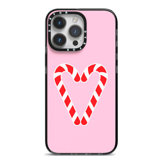 Candy Cane Heart iPhone 14 Pro Max Black Impact Case on Silver phone