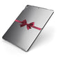 Christmas Bow Apple iPad Case on Grey iPad Side View
