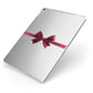 Christmas Bow Apple iPad Case on Silver iPad Side View