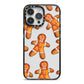 Christmas Gingerbread Man iPhone 14 Pro Max Black Impact Case on Silver phone