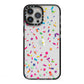 Confetti iPhone 13 Pro Max Black Impact Case on Silver phone