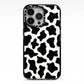 Cow Print iPhone 13 Pro Black Impact Case on Silver phone