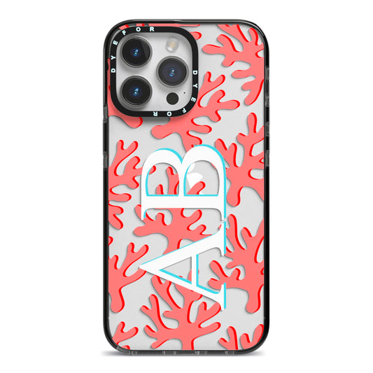 Custom Coral Initials iPhone 14 Pro Max Black Impact Case on Silver phone