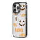 Custom Halloween Pumpkin Face iPhone 13 Pro Black Impact Case Side Angle on Silver phone