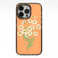 Daisies iPhone 13 Pro Black Impact Case on Silver phone