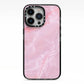 Dreamy Pink Marble iPhone 13 Pro Black Impact Case on Silver phone
