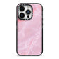 Dreamy Pink Marble iPhone 14 Pro Black Impact Case on Silver phone