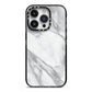 Faux Marble Effect White Grey iPhone 14 Pro Black Impact Case on Silver phone