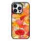 Floral Gerbera iPhone 14 Pro Black Impact Case on Silver phone