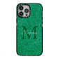 Green Monogram iPhone 13 Pro Max Black Impact Case on Silver phone