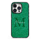 Green Monogram iPhone 14 Pro Black Impact Case on Silver phone