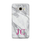 Grey Marble Pink Initials Samsung Galaxy J7 2016 Case on gold phone