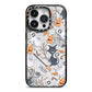 Grinning Cat Halloween iPhone 14 Pro Black Impact Case on Silver phone