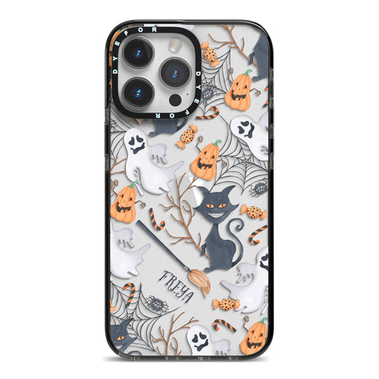 Grinning Cat Halloween iPhone 14 Pro Max Black Impact Case on Silver phone