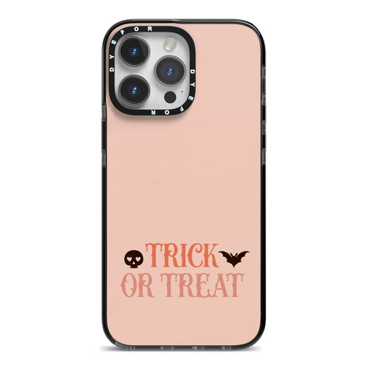 Halloween Trick or Treat iPhone 14 Pro Max Black Impact Case on Silver phone