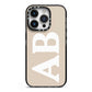 Initials iPhone 14 Pro Black Impact Case on Silver phone