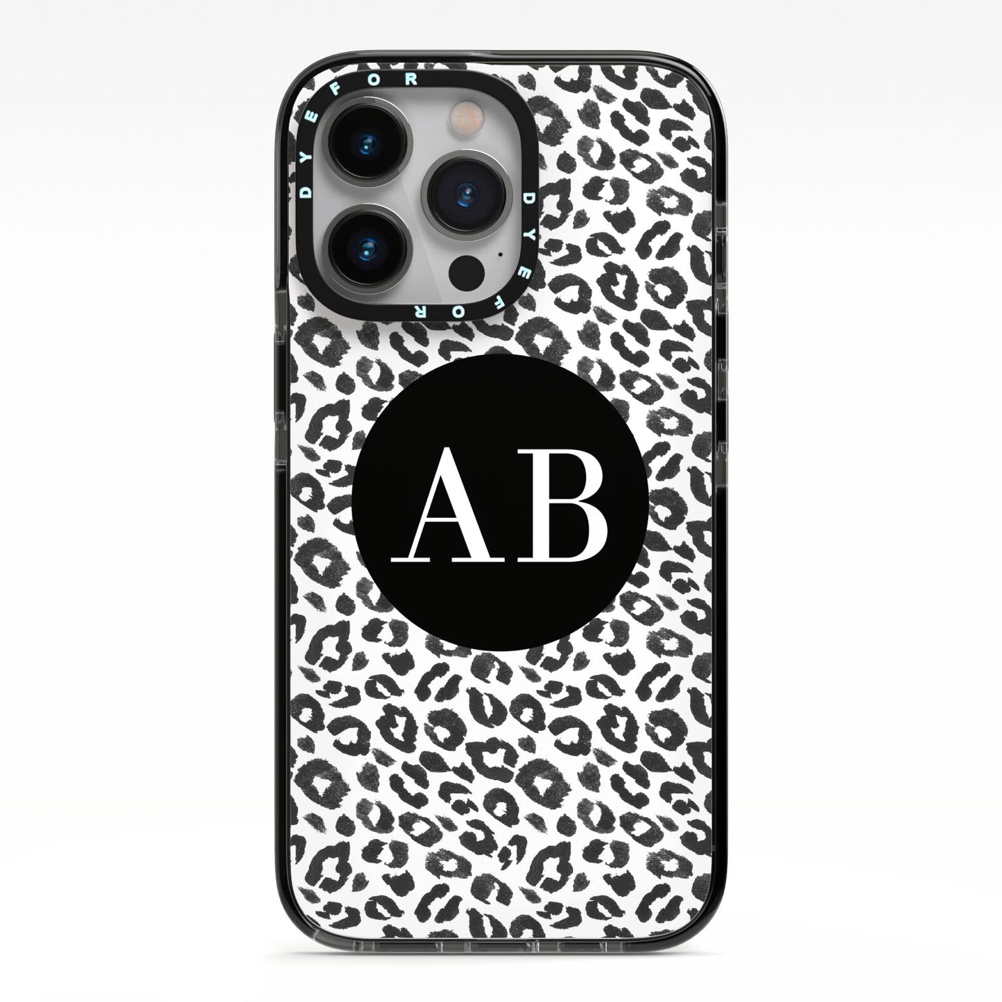 Leopard Print Black and White iPhone 13 Pro Black Impact Case on Silver phone