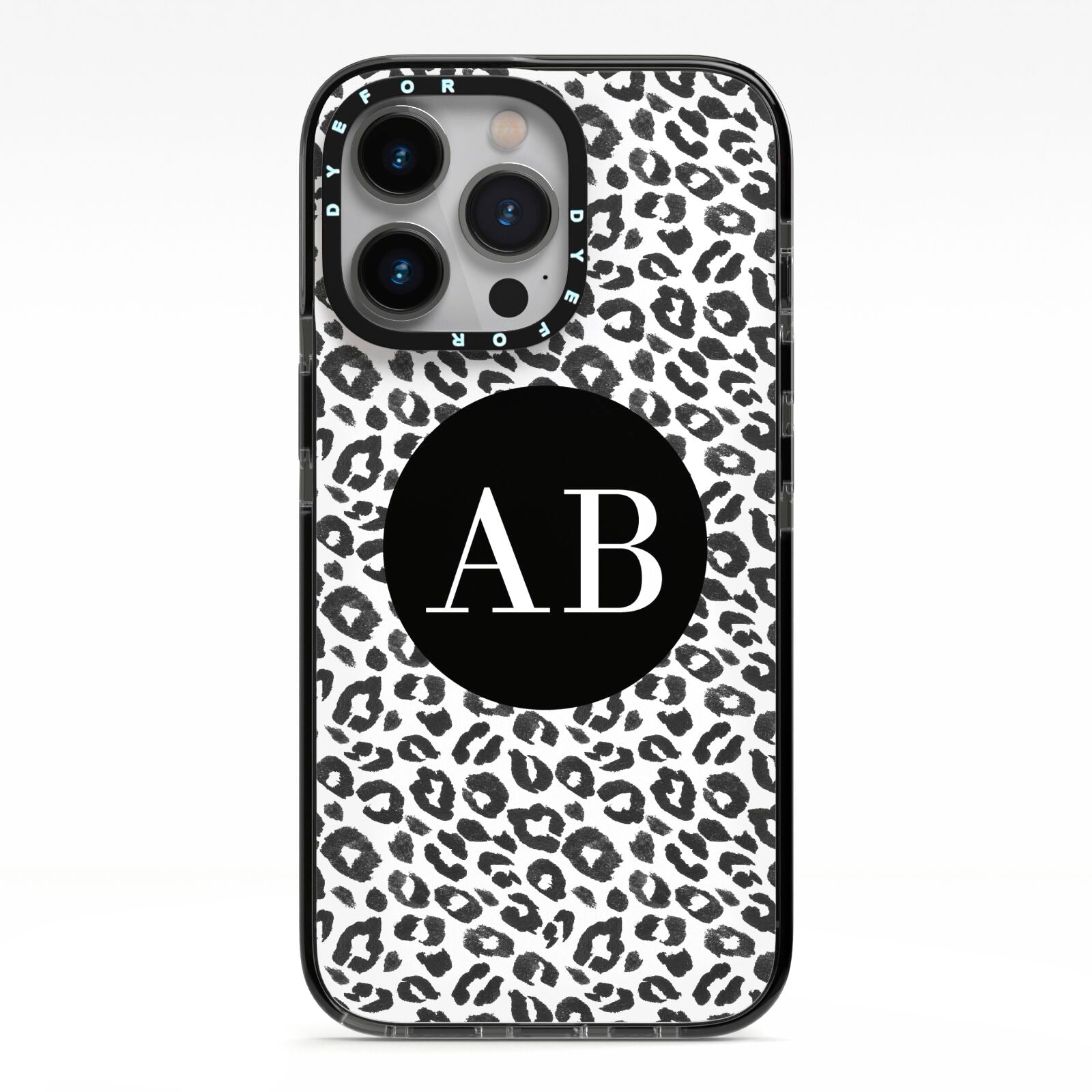 Leopard Print Black and White iPhone 13 Pro Black Impact Case on Silver phone