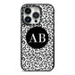 Leopard Print Black and White iPhone 14 Pro Black Impact Case on Silver phone