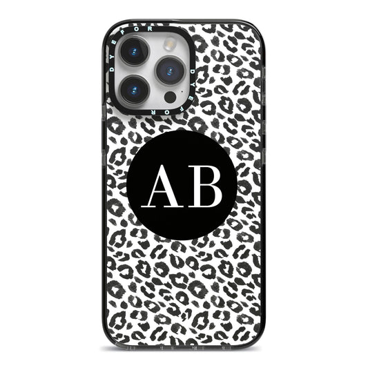 Leopard Print Black and White iPhone 14 Pro Max Black Impact Case on Silver phone