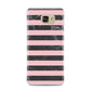 Marble Black Pink Striped Samsung Galaxy A7 2016 Case on gold phone