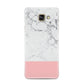 Marble White Carrara Pink Samsung Galaxy A3 2016 Case on gold phone